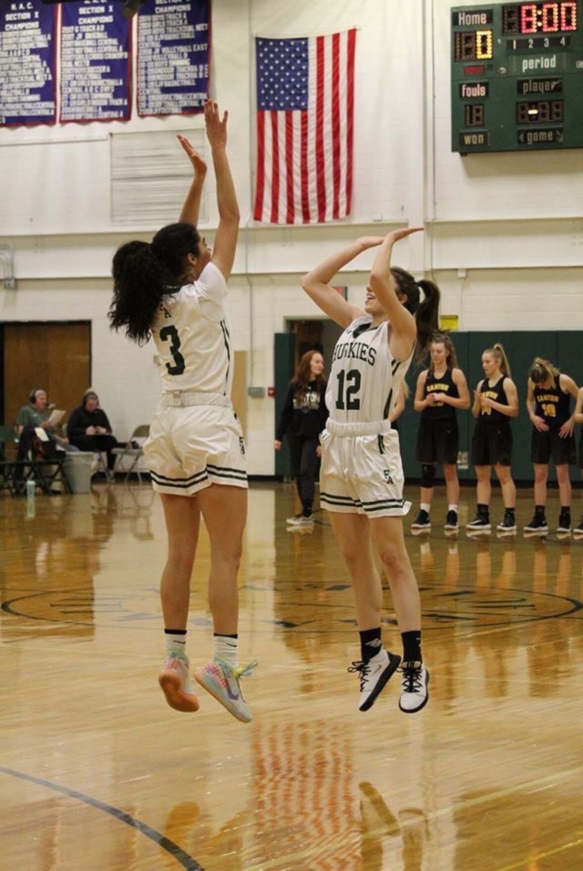 Malone girls basketball jump-five